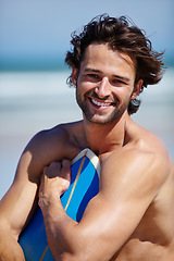 Image showing Beach surfboard, sports portrait and man smile for ocean freedom, sea waves or Portugal surf training vacation. Happiness, sunshine or outdoor surfer happy fresh air, wellness or surfing performance