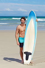 Image showing Beach portrait, surfboard and sports man on holiday, vacation or Spain getaway for nature, freedom or natural outdoor wellness. Surfboard, summer and face of relax surfer on tropical island sand