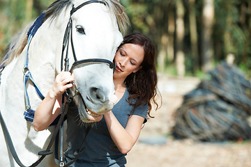 Image showing Woman with horse in countryside, animal and equestrian with riding outdoor and ranch. Sports, recreation and farm with young rider in nature, stable and jockey with mare or pet, training for rodeo