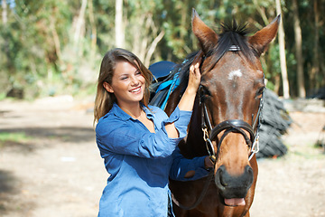 Image showing Happy woman outdoor with horse, animal and equestrian with riding, countryside and ranch. Sports, recreation and farm, young rider in nature, stable and jockey with mare or pet, training for rodeo