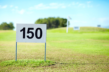 Image showing Golf course, sports and number with board for sign on driving range in summer for tournament. Lawn, grass and green for game or professional match, hobby and fun at club for relaxing activity