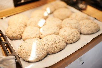 Image showing Closeup, tray and bread in an oven from a bakery for diet, nutrition and eating pastry food. Zoom, health and carbs, pita or loaves of rolls on a shelf for baking, cooking or lunch at a restaurant