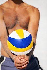 Image showing Beach volleyball, hands and sports person hit ball for serve, training performance or outdoor game competition. Sunshine, nature and competitive athlete for fitness, exercise and playing summer match