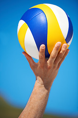 Image showing Beach, hands and sports person with volley ball for outdoor game, competition or tournament challenge. Summer wellness, blue sky and closeup volleyball player for fitness, exercise or active workout