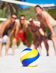 Image showing Beach, volleyball or team with sports ball for outdoor game, competition or collaboration challenge. Nature, sand or group of people, women or athlete men for fitness, exercise or training workout