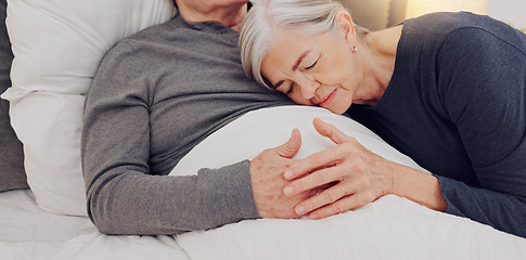 Image showing Hug, bed and senior couple in home for bonding, relationship and care for recovery in home. Marriage, retirement and elderly man and woman embrace in bedroom for healthcare, nursing and wellness