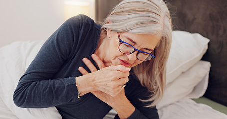 Image showing Sick, cough and senior woman in bed with allergies, flu or cold on a weekend morning at home. Illness, chest pain and elderly female person in retirement with asthma or infection in bedroom at house.
