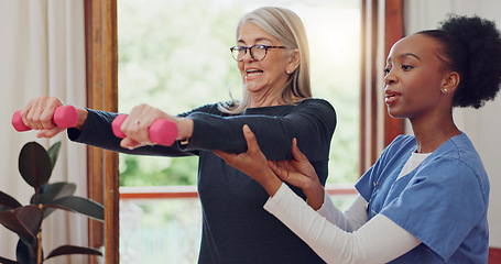 Image showing Physical therapy, exercise and senior woman with dumbbell, weightlifting and training arms and muscle. Strong, fitness and old person with nurse or physiotherapist to help in rehabilitation workout