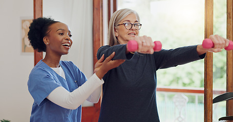 Image showing Physical therapy, exercise and senior woman with dumbbell, weightlifting and training arms and muscle. Strong, fitness and old person with nurse or physiotherapist to help in rehabilitation workout