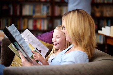 Image showing Reading, books and mom with child in library with smile, learning and relax, studying and knowledge. Storytelling, happy mother and girl on bookstore sofa together with story, fantasy and education.