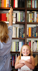 Image showing Portrait, books and child in library with excited smile, learning and relax with study knowledge. Storytelling, happy mom and girl in bookstore together with story, fantasy and education in reading.
