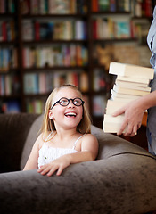 Image showing Smile, stack of books and child in library, learning and relax, studying homework knowledge on couch. School, woman and girl with glasses in bookstore together with story, and education on sofa.