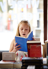 Image showing Shock, stack of books and child in bookshop, learning and studying, homework and knowledge in store. School, surprise face and girl in bookstore with story, fantasy and education in shop reading.