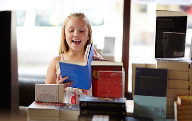 Image showing Smile, stack of books and child in bookshop, learning and relax, studying homework knowledge in store. School, happiness and girl reading in bookstore with story, fantasy and education in shop window