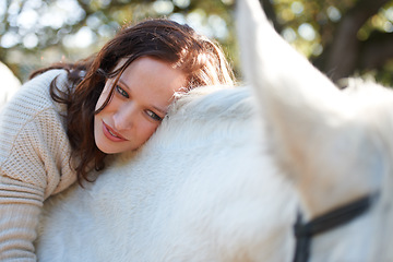 Image showing Nature, smile and woman laying on her horse on an outdoor farm for sports racing. Love, happy and young person from Canada with her equestrian animal or pet in countryside ranch for adventure.