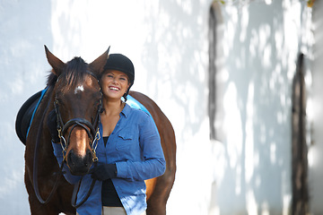 Image showing Smile, portrait and a woman with a horse for sports, farm training and riding for hobby. Happy, adventure and young rider with an animal for equestrian exercise for competition or race in nature.