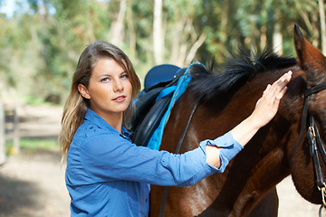 Image showing Smile, nature and portrait for woman with her horse on an outdoor farm for sports racing. Grooming, training and confident young female person from Canada with equestrian animal or pet in countryside