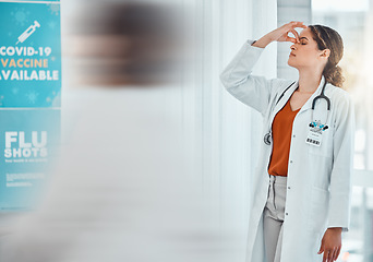 Image showing Stress, depression and tired covid female doctor working at vaccine station or hospital for healthcare and flu shots. Stressed, headache and burnout woman and medical practitioner for coronavirus