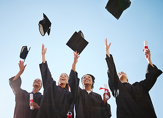 Image showing Graduation, students and education goal success celebration with happy women excited victory hat throw. University, motivation and friends graduate together, united achievement for young learners