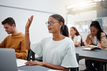Image showing Education through questions by students at university with diversity during lecture. Young woman in classroom, asking with hand up while classmate listen on. Motivation through discussion.