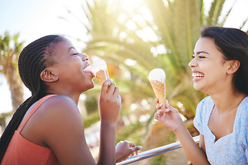 Image showing Laugh, smile and friends with ice cream on the beach while on summer vacation or trip together. Happiness, joy and girl best friends eating dessert in nature by the ocean or sea while on holiday.