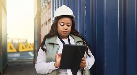 Image showing Logistics, business and black woman shipping containers being check or inspect cargo for transport. Female boss or worker with tablet confirm import, export or shipment for international supply chain