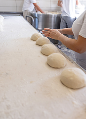 Image showing Bread dough balls in bakery