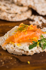 Image showing Smoked salmon on rice bread toasts