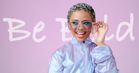 Image showing Stylish, bold and holographic fashion female with sunglasses and futuristic vaporwave clothing, excited and happy against a pink mockup background. Black woman model looking cool in a metallic jacket