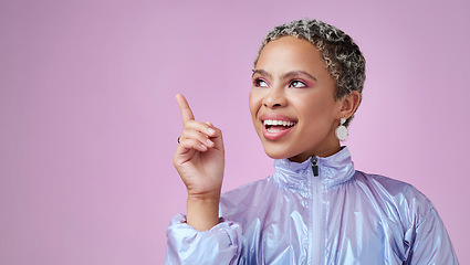 Image showing Thinking, idea and happy black woman in studio with mockup space with a solution. Happiness, smile and young african model with a positive thought, insight or question with purple background.