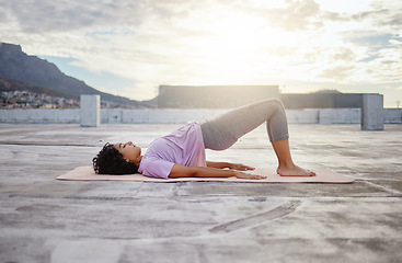 Image showing Yoga, woman and stretching for wellness, training and on yoga mat outdoor in sportswear. Health, young female and girl doing exercise workout, meditation and fitness outside for relax, calm and focus