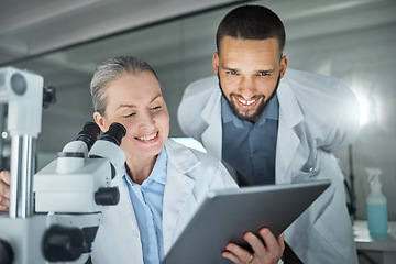 Image showing Laboratory collaboration, microscope or tablet in science data analysis, medical innovation help or healthcare research for mature woman or man. Smile, happy or dna scientist teamwork with technology