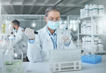 Image showing Medical science, covid lab and scientist working on research for healthcare for a virus at work. Doctor in medicine with a face mask for security from chemical while planning a development for future