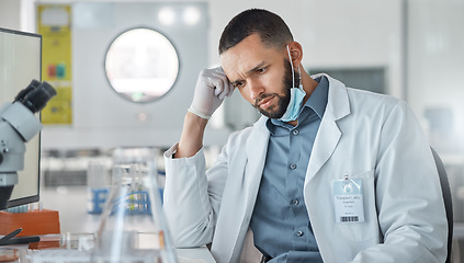 Image showing Science, research and covid with a confused man engineer working on innovation in his laboratory. Thinking, analytics and development with a male scientist at work in his medical lab on breakthrough