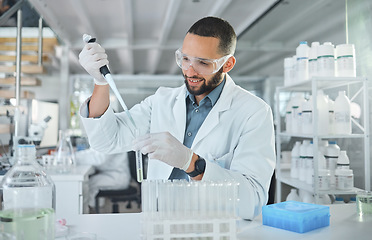 Image showing Scientist using test tube in lab for science, research and medicine. Portrait of man doing test in biotechnology, medical research and analytics in laboratory, testing a sample in healthcare clinic