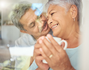 Image showing Love, coffee and relax with elderly couple bonding looking out a window together, content and cheerful in their home. Happy family, retirement and romance with mature man and woman enjoy retired life