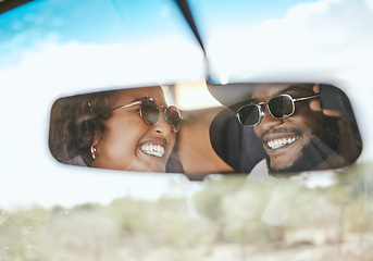 Image showing Road trip, travel and black couple happy about a holiday in a car mirror reflection together. Happiness and love smile of a girlfriend and boyfriend on a vacation trip ready for summer fun driving