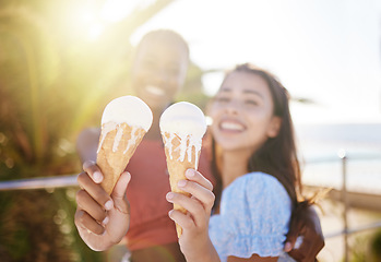 Image showing Ice cream, hands and women friends in city, outdoors or town having fun spending summer vacation time together. Diversity, love and lesbian couple or girls hug while eating gelato on date or walk.