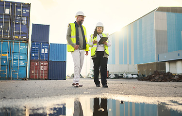 Image showing Logistics, digital tablet and industrial employees working on an outdoor cargo freight delivery site. Supply chain, collaboration and black people planning stock, container and shipping information.