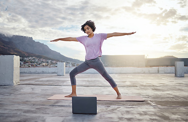 Image showing Yoga, laptop workout and woman outdoor training with stretching exercise on internet in Cape Town. Girl with pilates for wellness, energy and fitness health with video on streaming tutorial in a city