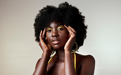 Image showing Black woman, fashion and face beauty in makeup against a mockup studio background. Portrait of an isolated beautiful African American model with stylish cosmetic art and afro hair style on copy space