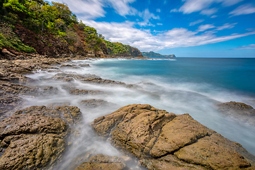 Image showing Long exposure, pacific ocean waves on rock in Playa Ocotal, El Coco Costa Rica