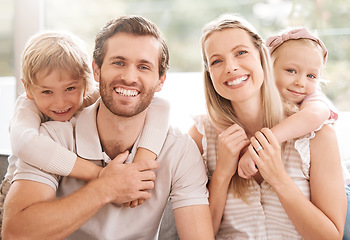 Image showing Happy family, father and mother portrait with children relaxing, hugging and enjoying fun quality time at home. Smile, mom and dad love bonding with young kids or boy and girl siblings affection