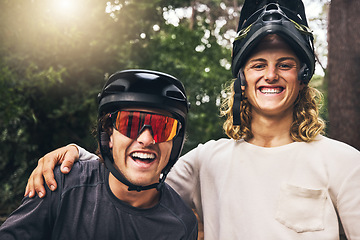 Image showing Friends taking a selfie together after cycling through nature trail in the forest. Portrait of cyclist men from Sweden or Norway smiling wearing mountain biking helmets after bicycle ride in a park
