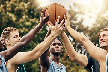 Image showing Training, friends and community support by basketball players hand connected in support of sports goal and vision. Fitness, trust and motivation on basketball court by happy, united professional men