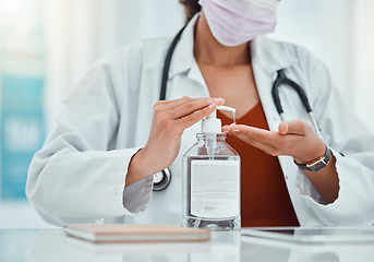 Image showing Covid, hand sanitizer and doctor woman in hospital office for hand cleaning healthcare safety, risk management and compliance. Covid 19, corona virus and healthcare worker with liquid bottle product