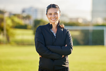 Image showing Soccer woman and coach portrait on field for match game in Mexico with optimistic and joyful smile. Proud, happy and excited Mexican football teacher smiling at professional sports tournament.