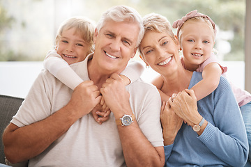 Image showing Relax, smile and grandparents with children in living room for love, family and retirement together. Happy, peace and support with old man and woman hug with kids at home for portrait, lounge and joy