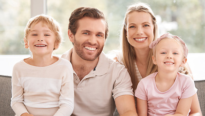 Image showing Family, children and smile on sofa for portrait together in living room happy in home, vacation or holiday. Mom, dad and kids show happiness, love and bonding on couch in lounge at their house