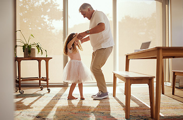 Image showing Grandfather, girl and dance holding hands in living room home. Love, smile and happy cute daughter dancing with caring grandpa spending time together, bonding and care having fun on weekend in house.